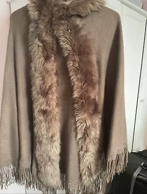 Buy Hooded Faux Fur Cape • 2.50£