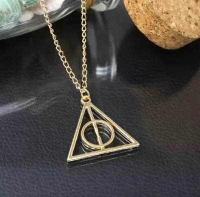 Buy ⭐️ Harry Potter Deathly Hallows Gold Colour Necklace Pendant Charm Gift ⭐️ • 3.99£
