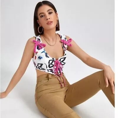 Buy SHEIN X Cute But Psycho Knot Front Graphic Print Corset Front Cropped Tank Top X • 16.10£