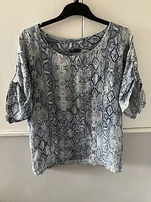 Buy Blue And White Snakeskin Top • 1.99£