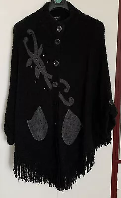 Buy Ladies Black With Appliqué Design One Size Woolen Cape By Angelina. • 1.50£
