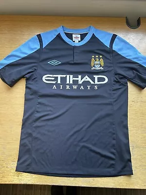 Buy Man City T Shirt • 8£