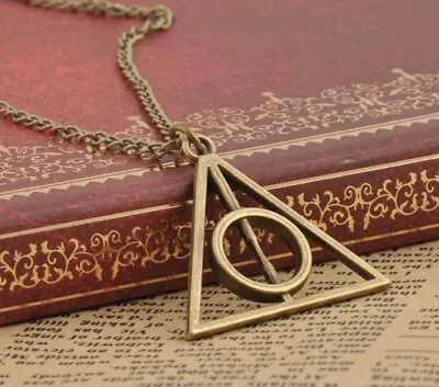 Buy Harry Potter Deathly Hallows Necklace Earrings Rotating Bronze Gift • 3.99£