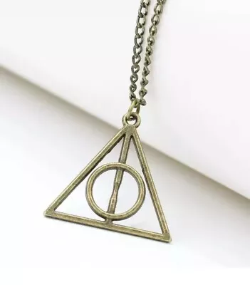 Buy ⭐️ Harry Potter Deathly Hallows Bronze Colour Necklace Pendant Charm Gift ⭐️ • 3.99£