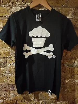 Buy Vintage Johnny Cupcakes Classic  Black Crossbones Logo Graphic, Size:  Small • 4.99£