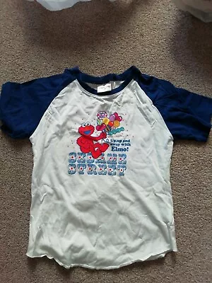 Buy Unisex Sesame Street Elmo T-shirt, Universal Studios. 154-162cm. 7 Years Approx  • 4.99£