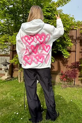 Buy Sprayed Hoodie - Graffiti Spray Clothing - White - Pink Hearts/Blue Evil Eye • 30£