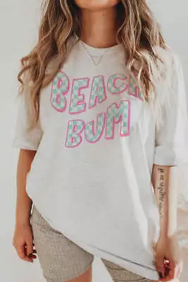 Buy Checkered Beach Bum Graphic T-shirt • 32.12£