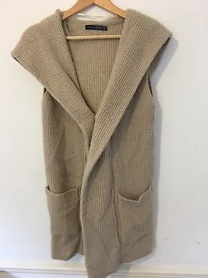 Buy Light Brown Wooly Sleeveless Jacket With Hood • 4£
