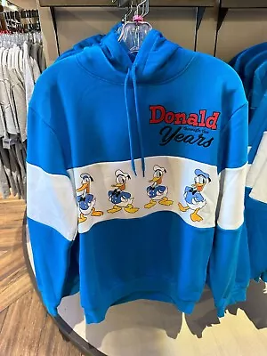 Buy 2024 Disney Parks Donald Duck 90th Anniversary Thru The Years Pullover Hoodie XS • 75.04£
